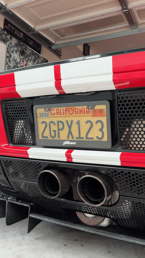 Blackout License Plate cover on 2006 Ford GT, California License Plate Carbon Fiber Frame, Day Time Shot Blackout License Plate Gif Inside Garage